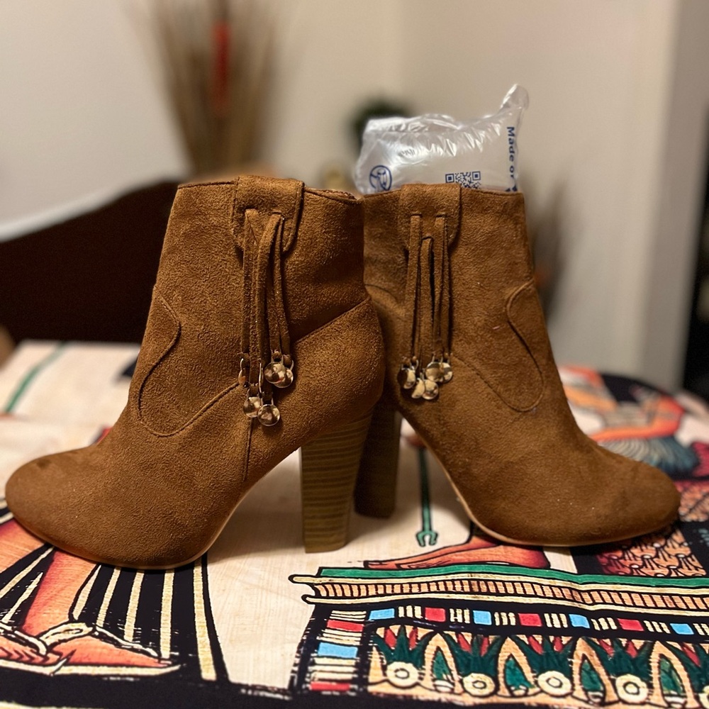 Women’s suede ankle boots .